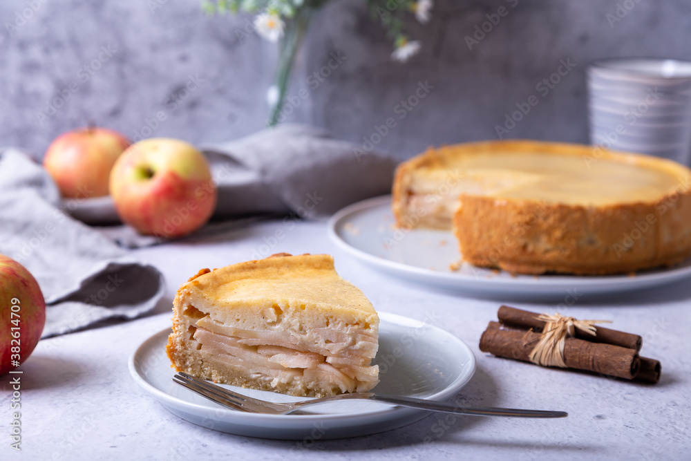 Apple pie with cinnamon and sour cream. Homemade baking. Traditional Russian pie. Close-up. Apple pie with cinnamon and sour cream. Homemade baking. Traditional Russian pie. Close-up.