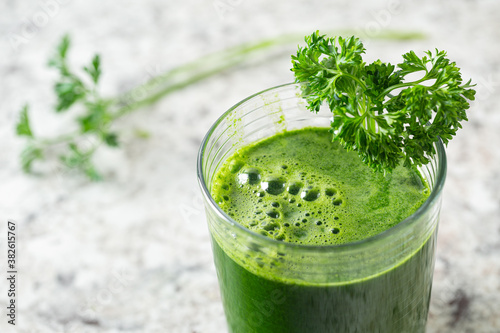 Close up of fresh immune boosting green juice with copy space photo