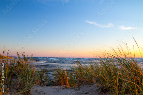 Beach sunset landscape on the coast of Lake Michigan at Ludington State Park.