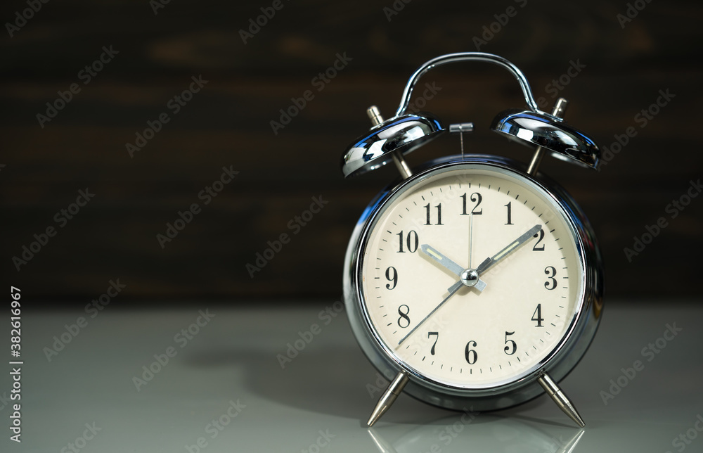 Retro alarm clock on table Retro alarm clock on table