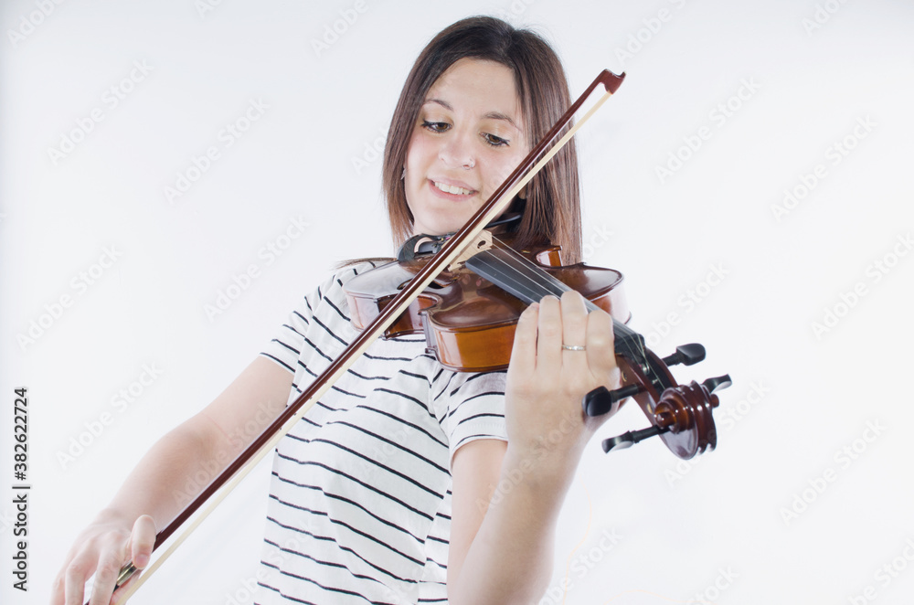 half body of a Girl Playing the Violin Fiddle. White background.