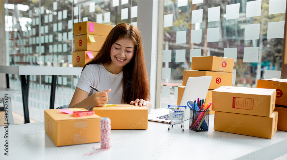 Asian Young entrepreneur, teenager SME business owner work at home, alpha generation life style, SME online business conceptual Asian Young entrepreneur, teenager SME business owner work at home, alpha generation life style, SME online business conceptual