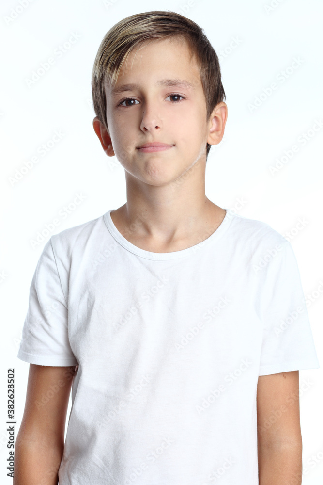 Photo of adorable young happy boy looking at camera. Photo of adorable young happy boy looking at camera.