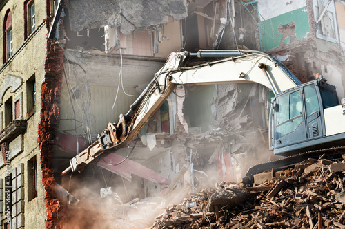 excavator loader machine at demolition construction site