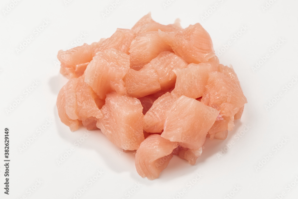 Heap of freshly cut chicken meat on white background Heap of freshly cut chicken meat on white background