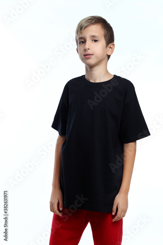 Portrait of casual boy on white background