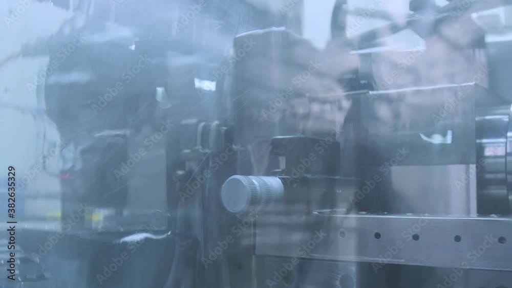 close up Milling shapes out of a metal piece on a CNC machine close up Milling shapes out of a metal piece on a CNC machine