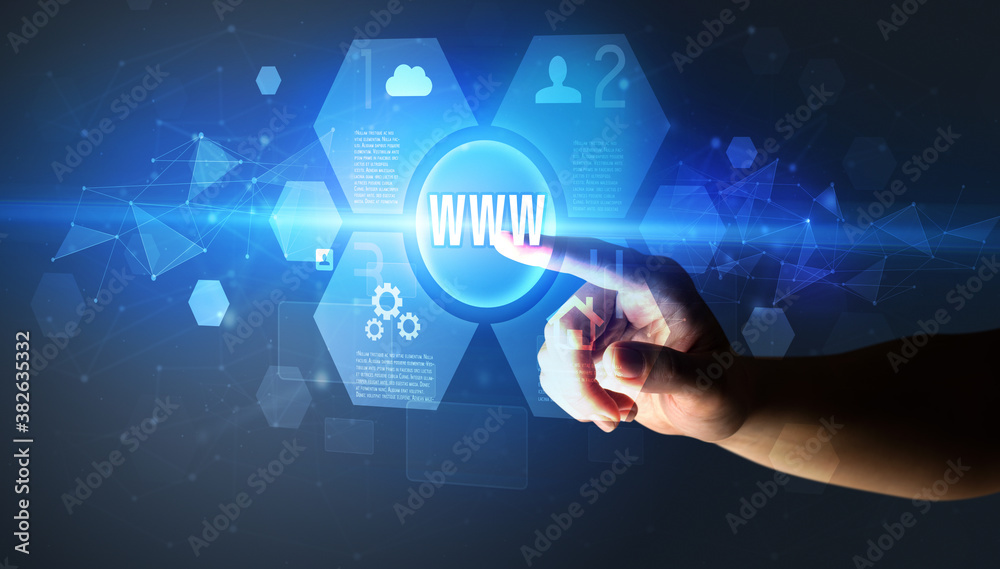 Hand touching WWW inscription, new technology concept Hand touching WWW inscription, new technology concept