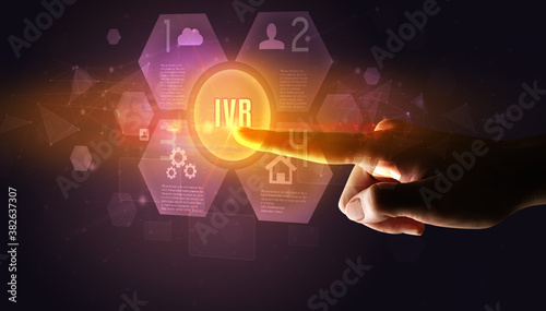 Hand touching IVR inscription, new technology concept