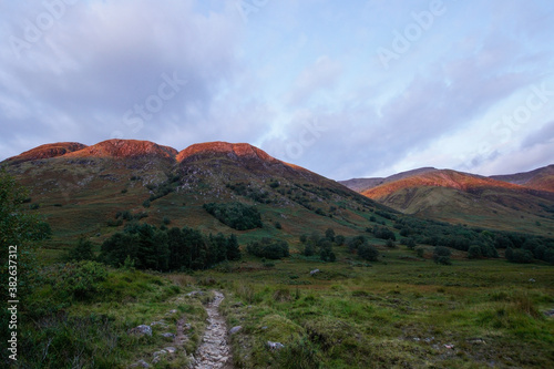 Glen Nevis with Ben Nevis in the back during sunset. Ben Nevis is the highest mountain on the British Isles © 13threephotography