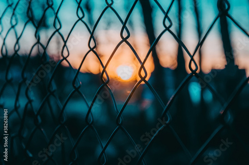 Fence grid sunset