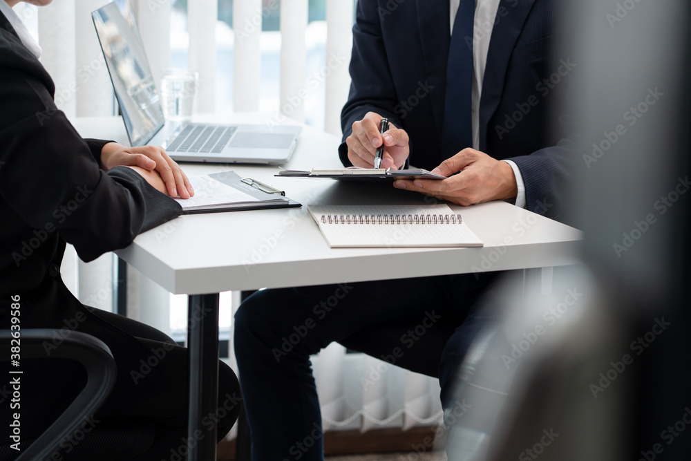 confident businessman sitting in front of office manager talk conducting to interviewer with colleague or boss for business confident businessman sitting in front of office manager talk conducting to interviewer with colleague or boss for business