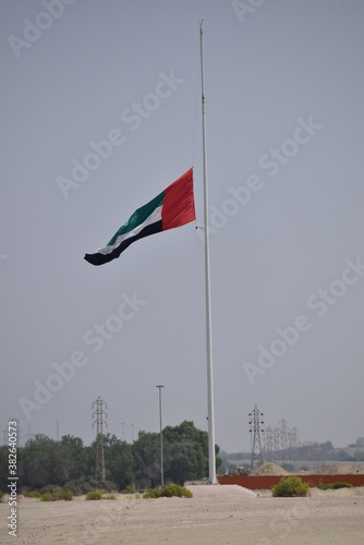 Commemoration Day concept.UAE national flag fly at half mast.Abu Dhabi,UAE.30.09.2020.