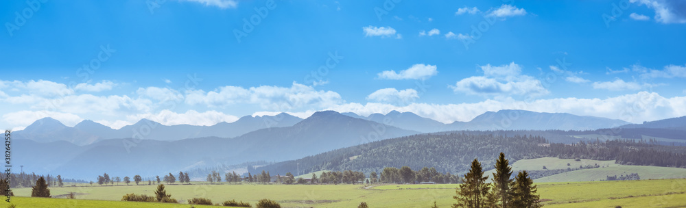 Panorama of Tatra Mountains in sunny summer day