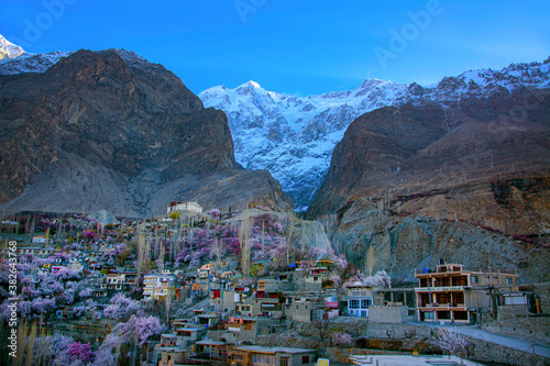 landscape of hunza in spring season with baltit fort and ultar beak in background  photo