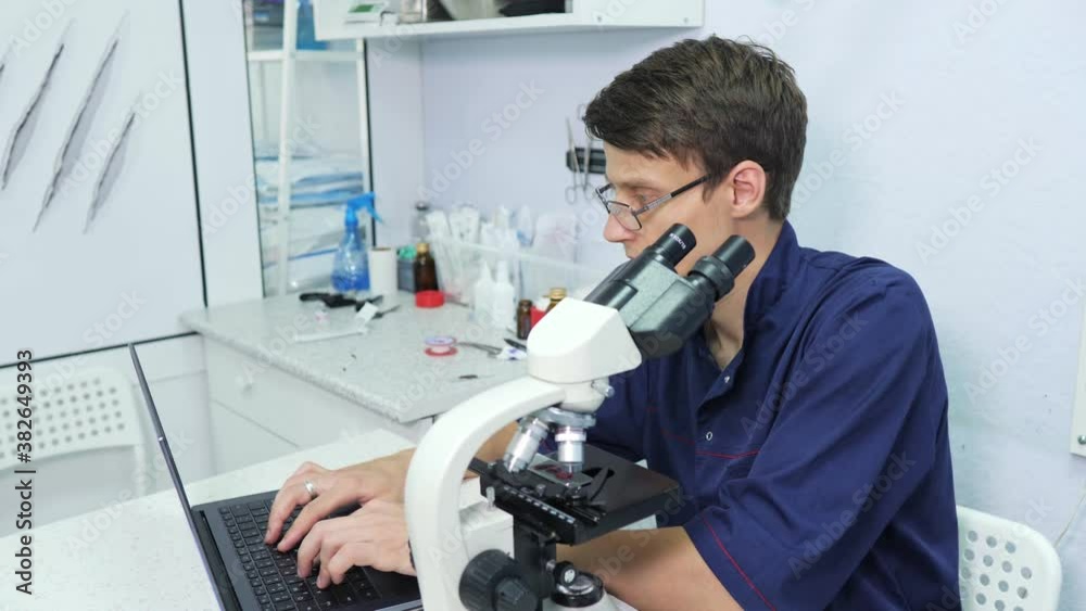 Scientist in lab analysis of new corona virus, a sample of the blood in laboratory. Covid-19 concept