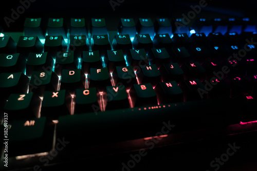 Close-up of RGB backlit keyboard. Gaming keyboard.