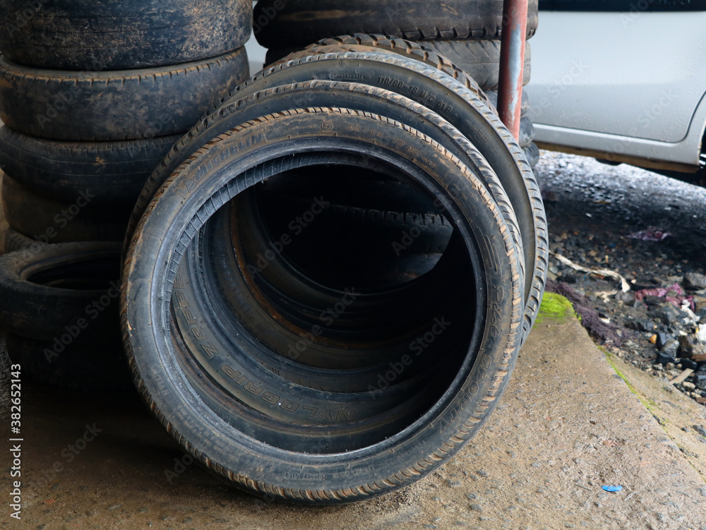 Old rubber tyres kept for resoling Old rubber tyres kept for resoling