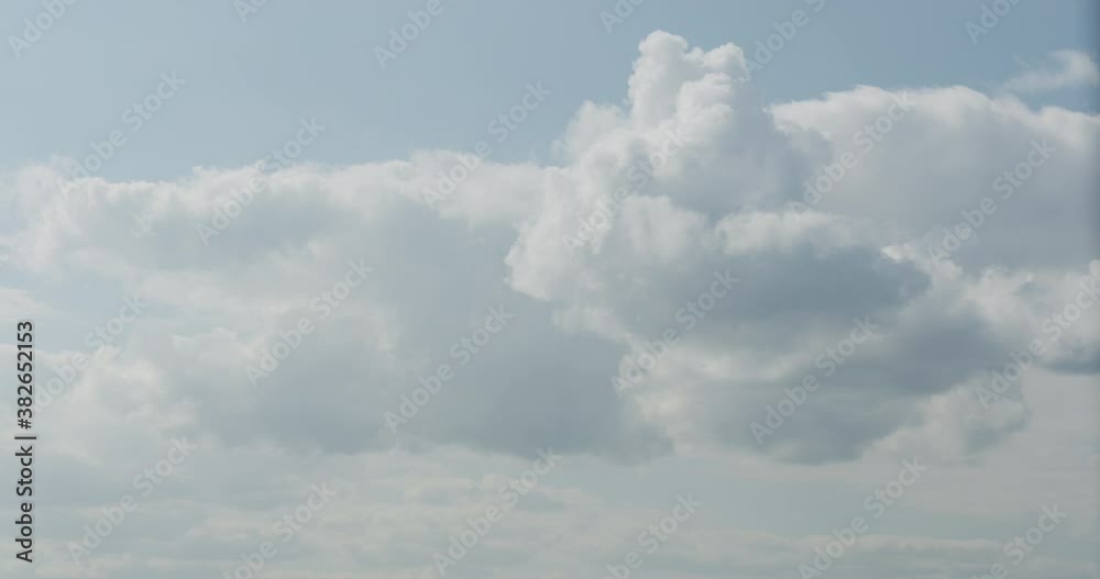 Simple white clouds over blue sky in midday Simple white clouds over blue sky in midday