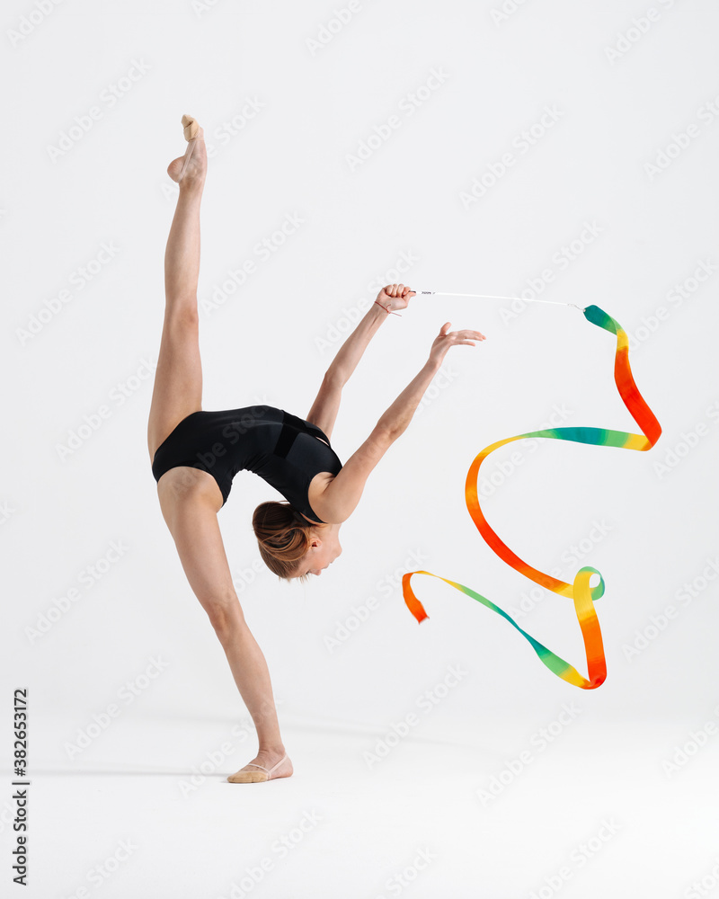 Young gymnast girl stretching and training Young gymnast girl stretching and training