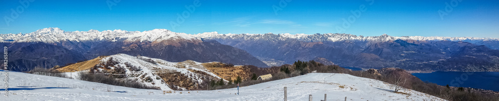 ultra wide aerial view of the Lake Maggiore and the Alps from Mottarone