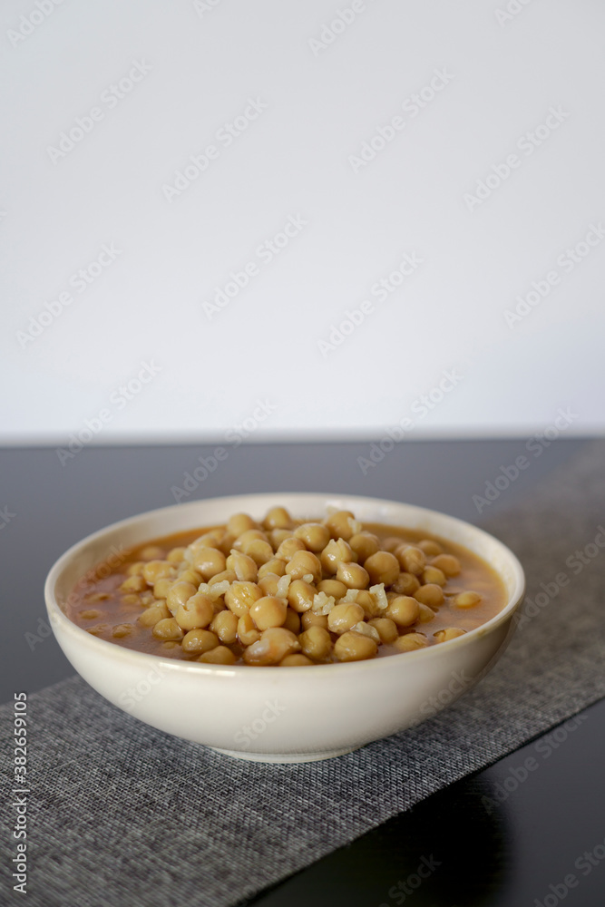 typical vegan dish of legumes with chickpeas, rice and soup typical vegan dish of legumes with chickpeas, rice and soup
