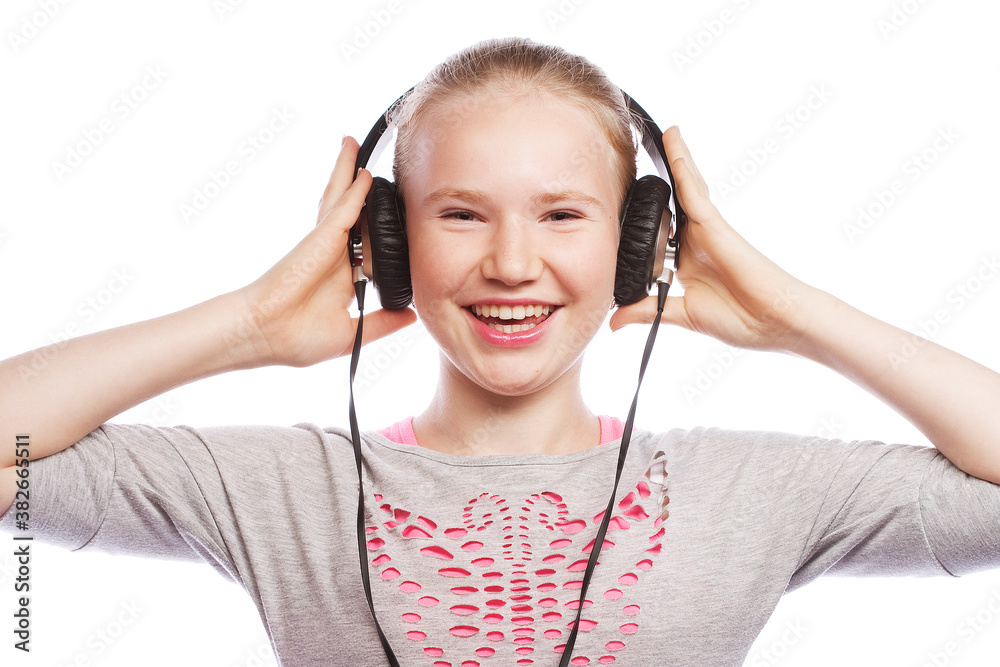 Beautiful happy little girl with headphones Beautiful happy little girl with headphones