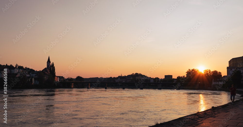 Panoramic view of Passau at the Danube River at sunset, golden hour, Germany