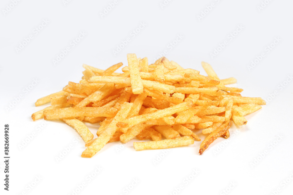 Portion of salty fried potato sticks isolated on white background Portion of salty fried potato sticks isolated on white background