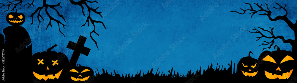 HALLOWEEN background banner wide panoramic panorama template -Silhouette of scary carved luminous cartoon pumpkins, trees and cross isolated on dark blue texture in a cemetery HALLOWEEN background banner wide panoramic panorama template -Silhouette of scary carved luminous cartoon pumpkins, trees and cross isolated on dark blue texture in a cemetery