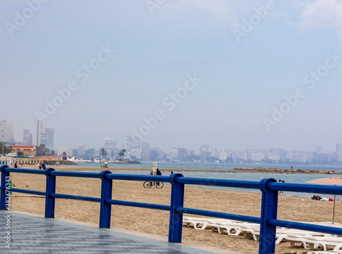 Postiguet Beach seen from Promenade in Alicante, mediterranen city of Costa Blanca.Spain