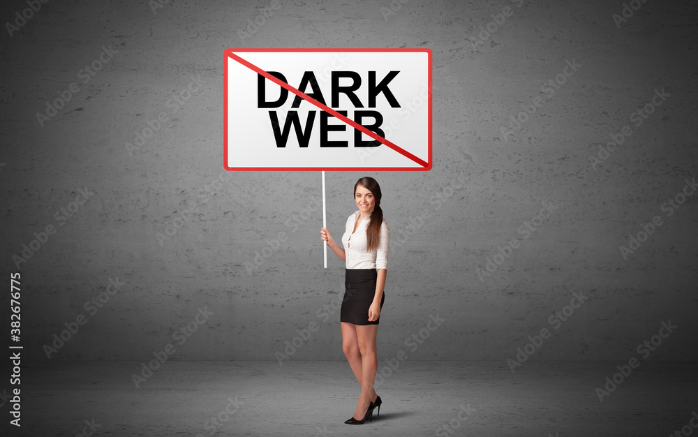 business person holding a traffic sign with DARK WEB inscription, new idea concept business person holding a traffic sign with DARK WEB inscription, new idea concept
