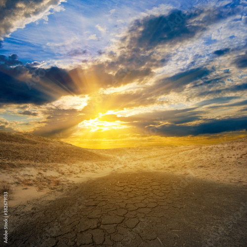 dry cracked saline land at the sunset  outdoor disaster background