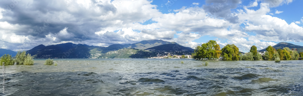 wide panorama of the Lake Maggiore in flood after the storm