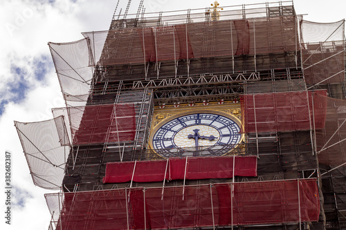 The tower holding Big Ben covered in scaffolding due to repairs photo