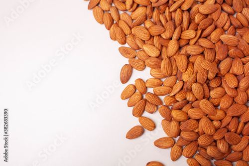 Background of nuts almonds isolated. View from above