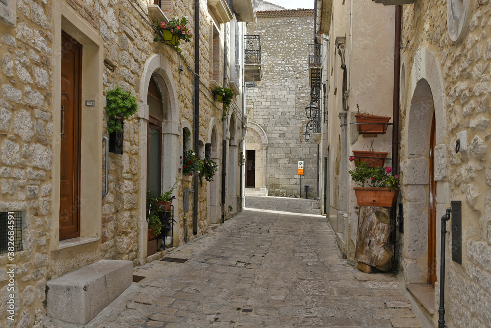 A narrow street among the old houses of Ferrazzano, a medieval village in the Molise region.
