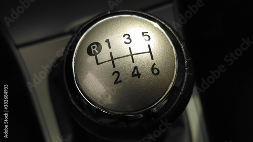 Gear lever shift handle of mechanical transmission gear box with six speeds and rear move.