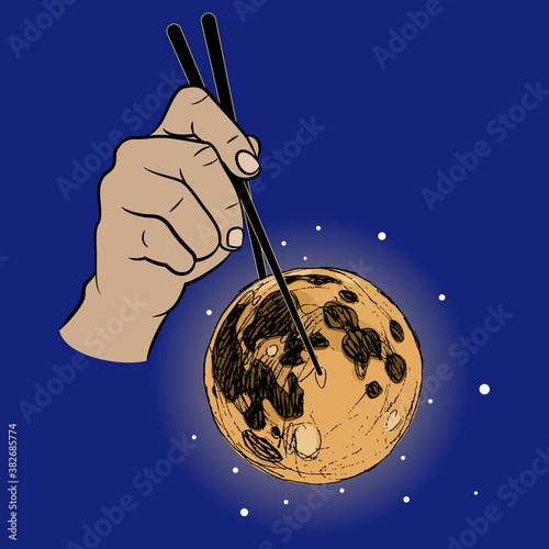 Human hand holding full moon chopsticks. Creative environmental concept. 