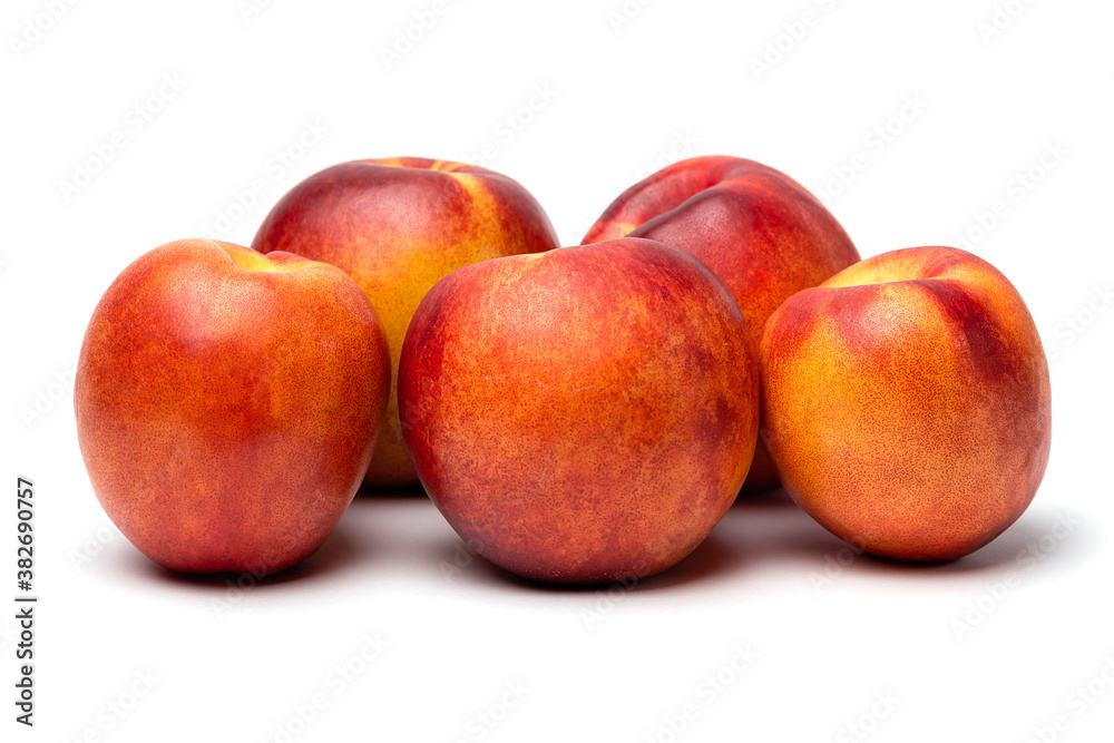 fresh juicy nectarines on a white background fresh juicy nectarines on a white background