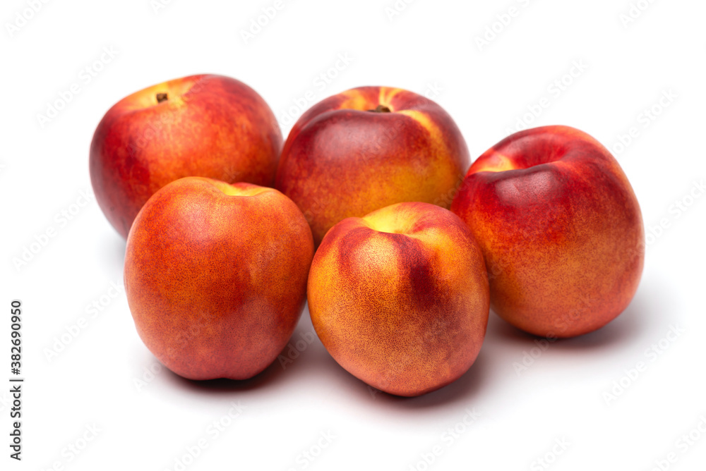fresh juicy nectarines on a white background fresh juicy nectarines on a white background