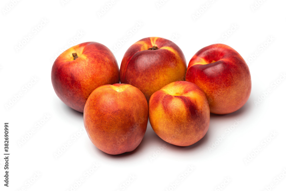 fresh juicy nectarines on a white background fresh juicy nectarines on a white background
