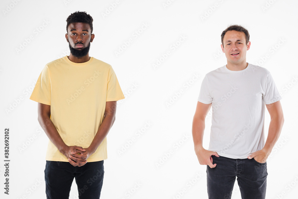 Two handsome men posing together isolated over white background Two handsome men posing together isolated over white background