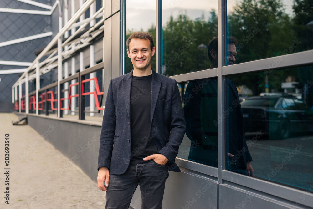 Portrait of an handsome businessman outdoors in front of office Portrait of an handsome businessman outdoors in front of office