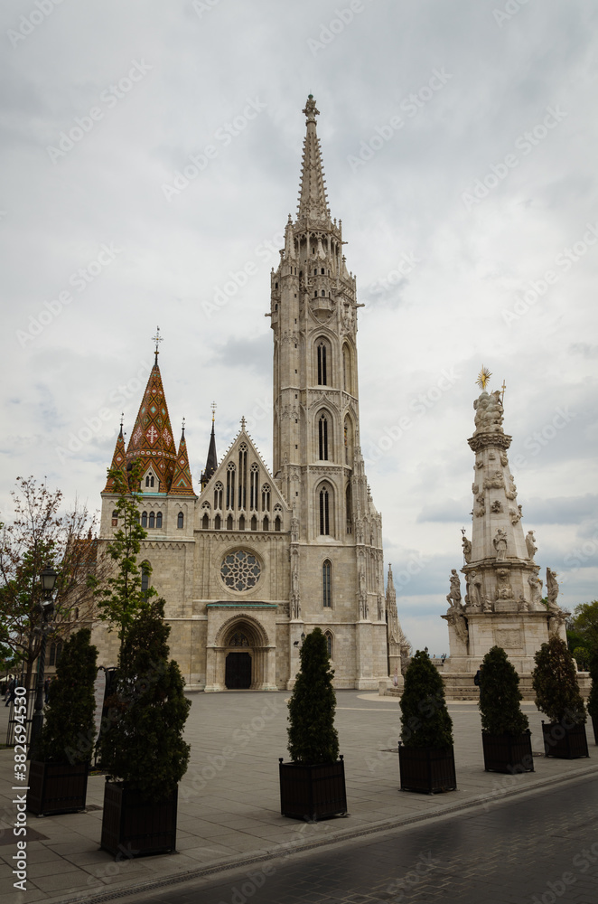 Gothic-style St. Matthias church in the castle district on a cloudy day, Budapest, Hungary