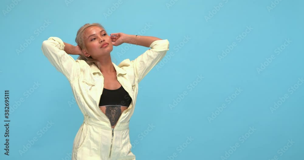 Studio, slow motion, young woman posing Studio, slow motion, young woman posing