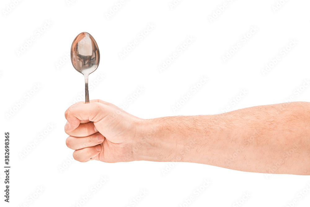 hand holding spoon isolated on white background hand holding spoon isolated on white background