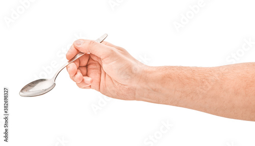hand holding spoon isolated on white background