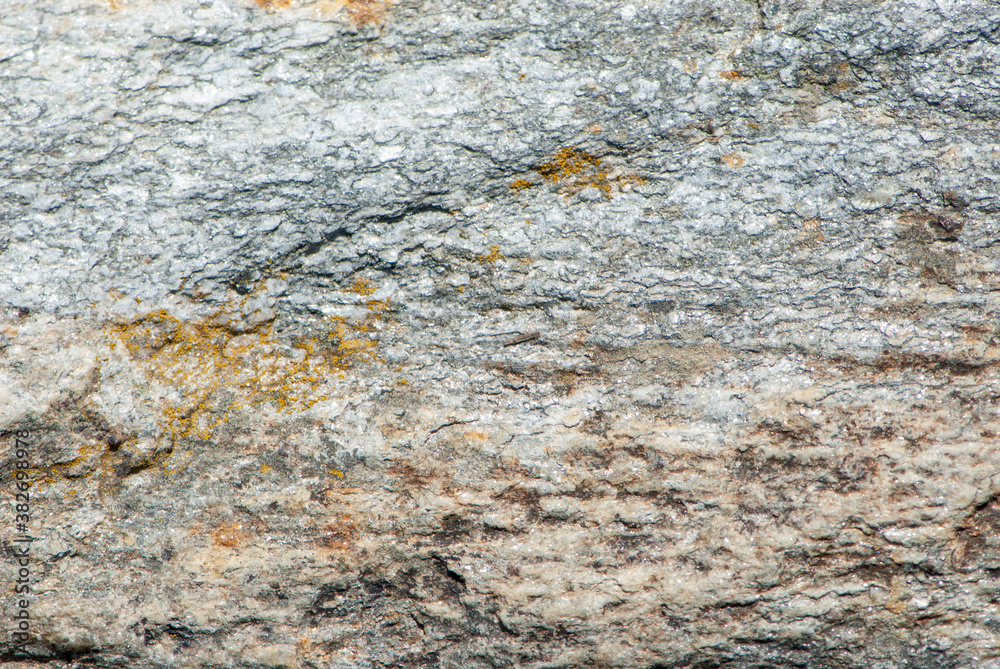 Naklejka premium Alpine close-up grunge stone or rock texture in different colours