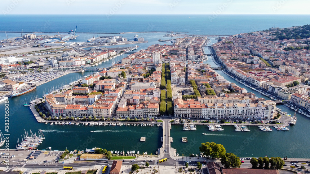 Aerial view of the old town center of Sete in the South of France - Two urbanised islands surrounded with ancient canals between the Mediterranean Sea and the Pond of Thau